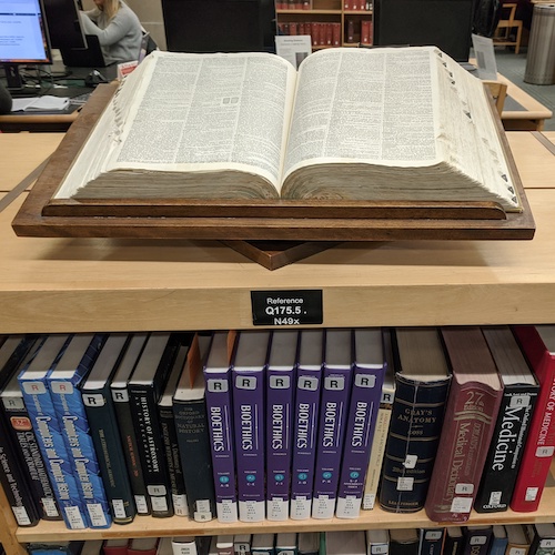 A photograph of books on a shelf